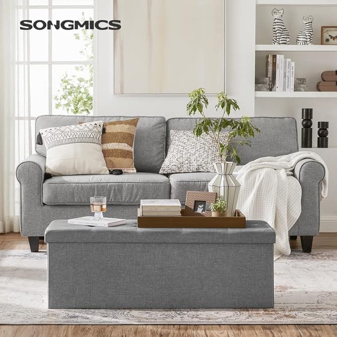 SONGMICS MAZIE Collection - 43 Inches Folding Storage Ottoman Bench, Ottoman Foot Rest, End of Bed Bench, Storage Chest, Load 660 lb, for Living Room, Bedroom, Entryway, Light Gray ULSF77G-Ruum Studio Home