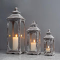 TRIROCKS Set of 3 Vintage Candle Lanterns 10/14/19.5''H Decorative Outdoor Lantern Metal Candle Holder with Tempered Glass for Home Living Room Garden Yard Parties Event Indoors Outdoors (Cement Grey)-Ruum Studio Home