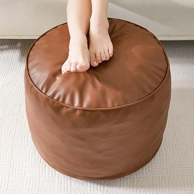 HIGOGOGO Round Stuffed Pouf Ottoman, Pu Leather Poufs with Foam Chunk Filling Foot Stool Storage Ottoman, 26 X 18 Floor Poufs Foot Rest for Living Room, Brown-Ruum Studio Home
