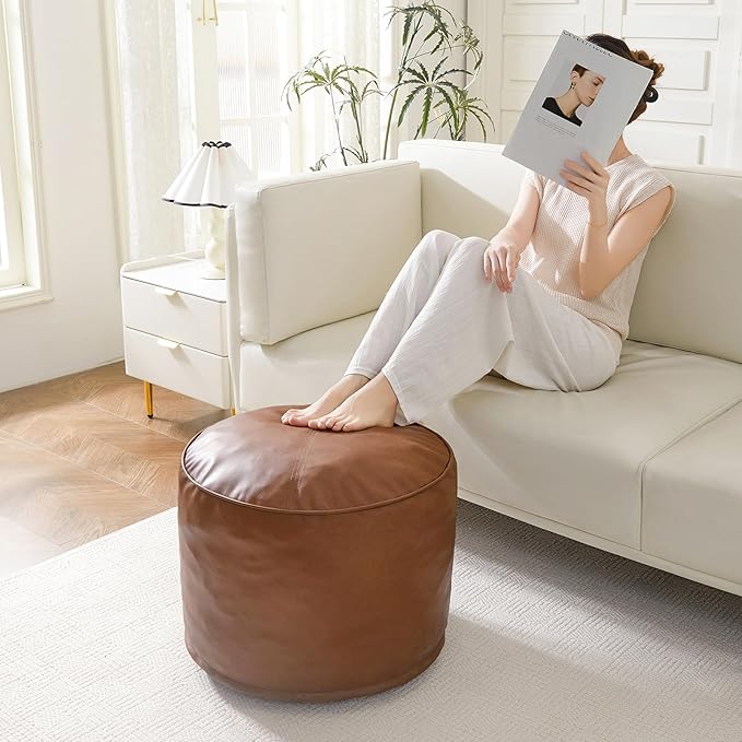 HIGOGOGO Round Stuffed Pouf Ottoman, Pu Leather Poufs with Foam Chunk Filling Foot Stool Storage Ottoman, 26 X 18 Floor Poufs Foot Rest for Living Room, Brown-Ruum Studio Home