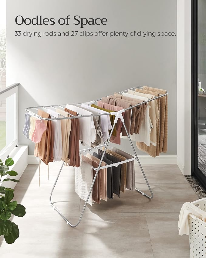 SONGMICS Clothes Drying Rack, with Sock Clips, Metal Laundry Rack, Foldable, Space-Saving, Free-Standing Airer, with 2 Height-Adjustable Gullwings, Indoor Outdoor Use, Silver and White ULLR052W01-Ruum Studio Home