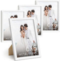 HAUS AND HUES 6x8 White Metal Picture Frames - Photo Frames 6x8 - Features Premium Aluminum, Vertical Hanging, Easel Back for Tabletop, Home, Office (6x8 in, White, Set of 4)-Ruum Studio Home