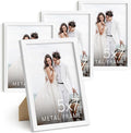 HAUS AND HUES 5x7 White Metal Picture Frames - Photo Frames 5X7 - Features Premium Aluminum, Vertical Hanging, Easel Back for Tabletop, Home, Office (5x7 in, White, Set of 4)-Ruum Studio Home
