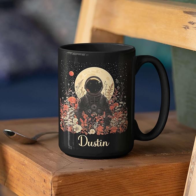 Astronaut with Moon and Wildflowers Coffee Mug, Custom Name Ceramic Cup 11oz 15oz, Unique Astronaut Coffee Cup for Friends, Personalized Astronomy Black Mug, Gifts for Birthday-Ruum Studio Home