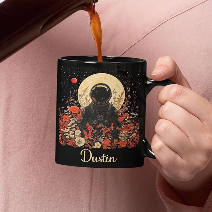 Astronaut with Moon and Wildflowers Coffee Mug, Custom Name Ceramic Cup 11oz 15oz, Unique Astronaut Coffee Cup for Friends, Personalized Astronomy Black Mug, Gifts for Birthday-Ruum Studio Home