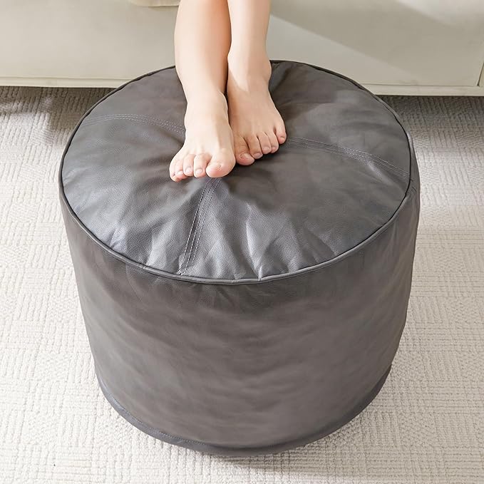 HIGOGOGO Round Stuffed Pouf Ottoman, Pu Leather Poufs with Foam Chunk Filling Foot Stool Storage Ottoman, 26 X 18 Floor Poufs Foot Rest for Living Room, Grey-Ruum Studio Home