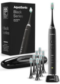 Aquasonic Black Series Ultra Whitening Toothbrush – ADA Accepted Electric Toothbrush- 8 Brush Heads & Travel Case – 40,000 VPM Electric Motor & Wireless Charging - 4 Modes w Smart Timer-Ruum Studio Home