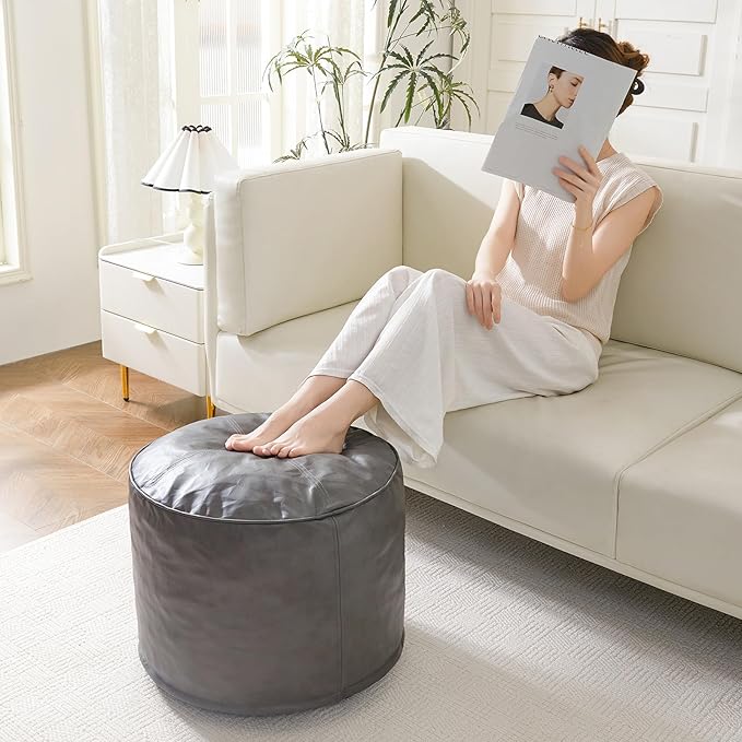 HIGOGOGO Round Stuffed Pouf Ottoman, Pu Leather Poufs with Foam Chunk Filling Foot Stool Storage Ottoman, 26 X 18 Floor Poufs Foot Rest for Living Room, Grey-Ruum Studio Home