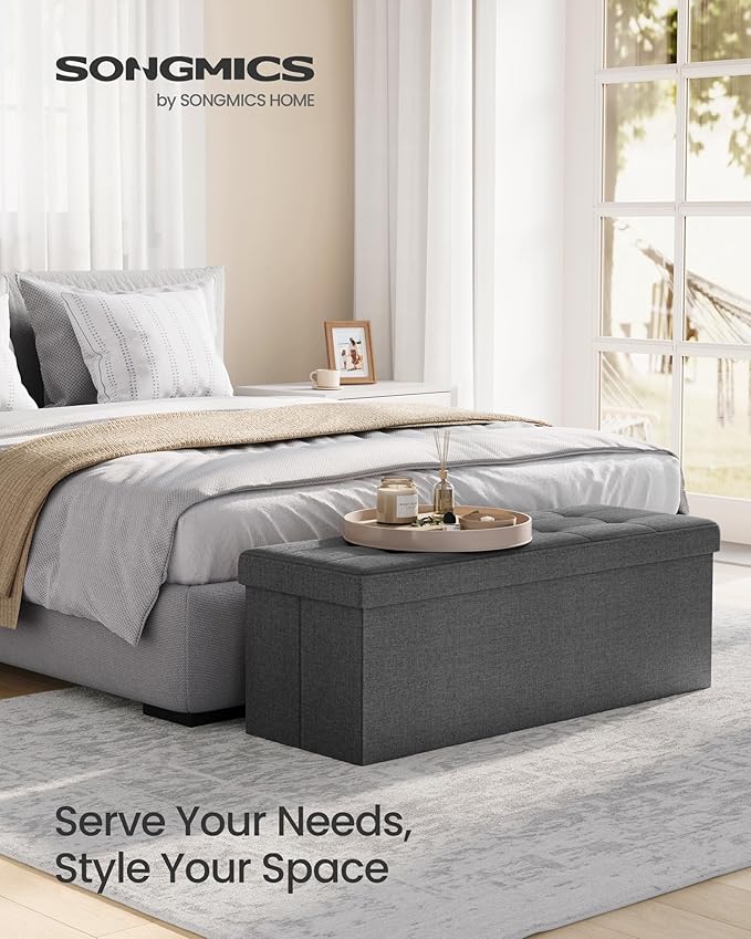 SONGMICS MAZIE Collection - 43 Inches Folding Storage Ottoman Bench, Ottoman Foot Rest, End of Bed Bench, Storage Chest, Load 660 lb, for Living Room, Bedroom, Entryway, Dark Gray ULSF77K-Ruum Studio Home