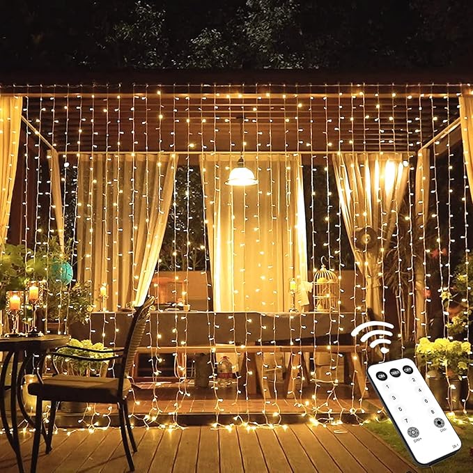 JMEXSUSS 600 LED Christmas Curtain Lights Outdoor, 9.5x19.6ft Christmas String Light Plug in with Remote, 8 Modes Wall Hanging Lights for Bedroom Party Backdrop Wedding Xmas Decor, Warm White-Ruum Studio Home