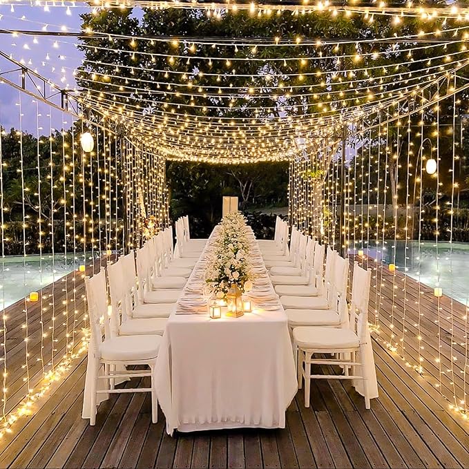 JMEXSUSS 300 LED Remote Control Curtain Lights, Plug in Fairy Curtain Lights Outdoor, Window Wall Hanging String Lights for Bedroom Backdrop Wedding Party Indoor Christmas Patio Dorm Decor, Warm White-Ruum Studio Home