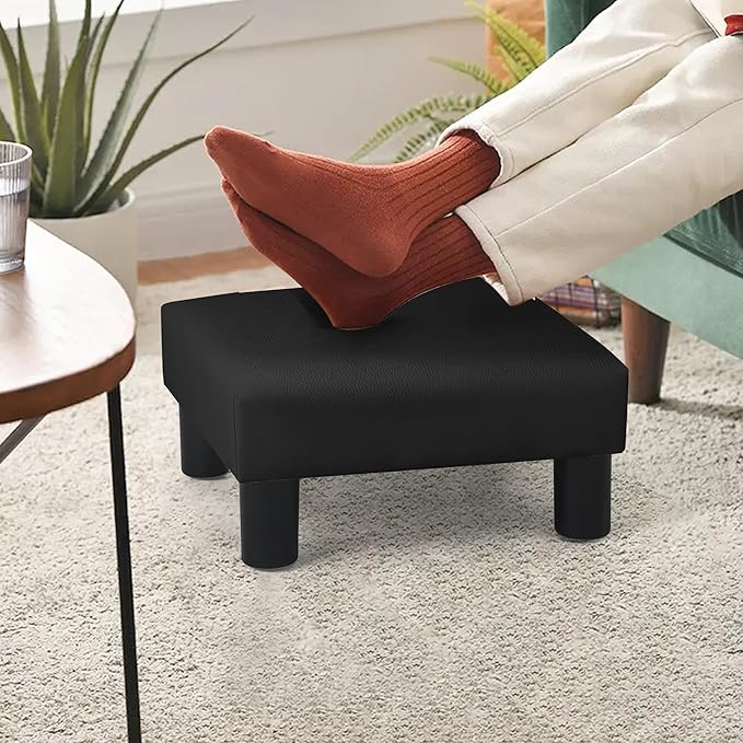 Joveco Small Footstool Ottoman, PU Leather Square Upholstered Footrest with Plastic Legs, Under Desk Foot Stools for Living Room Bedroom Office, Black-Ruum Studio Home