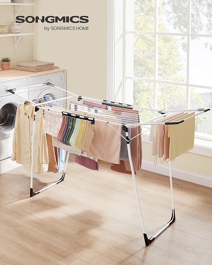 SONGMICS Clothes Drying Rack Foldable, Gullwing Laundry Drying Rack, Space-Saving, 22.2 x 68.1 x 38 Inches, Sock Clips, Metal Structure, for Clothes, Towels, Linens, Indoor, Outdoor White ULLR518W01-Ruum Studio Home