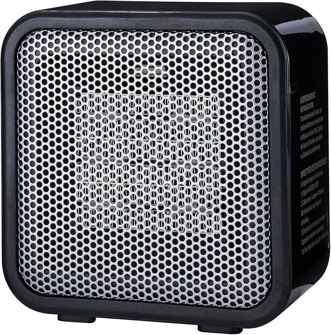 Amazon Basics Ceramic Space Heater, Mini Heater for Office Desk, Portable Tent Heater for Camping (Indoor Use), 500 W, With Tip-Over Protection, Lightweight (1.4 LBS), Black, 5.87”D x 3.15”W x 5.95”H-Ruum Studio Home