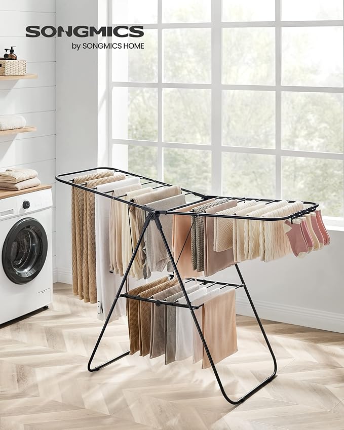SONGMICS Clothes Drying Rack, with Sock Clips, Metal Laundry Rack, Foldable, Space-Saving, Free-Standing Airer, with 2 Height-Adjustable Gullwings, Indoor Outdoor Use, Black ULLR052B01-Ruum Studio Home