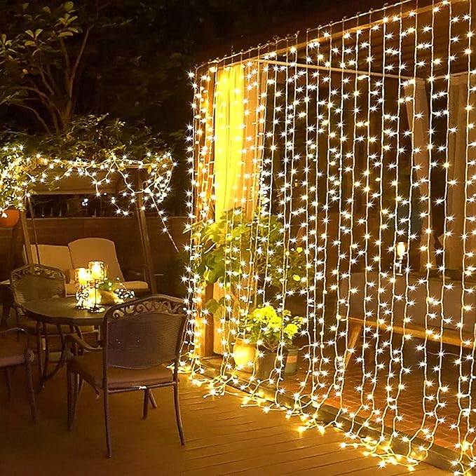 JMEXSUSS 300 LED Remote Control Curtain Lights, Plug in Fairy Curtain Lights Outdoor, Window Wall Hanging String Lights for Bedroom Backdrop Wedding Party Indoor Christmas Patio Dorm Decor, Warm White-Ruum Studio Home