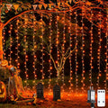 JMEXSUSS 300LED Orange Halloween Lights with Remote, 9.8x9.8ft Halloween Curtain Light, 8 Modes Orange Hanging String Lights Plug in for Fall Bedroom Thanksgiving Window Party Indoor Outdoor Decor-Ruum Studio Home