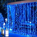 JMEXSUSS 300LED Christmas Curtain Lights, Blue Christmas Lights with Remote, Blue String Lights for Bedroom Wall Window Backdrop Garden Indoor Outdoor Patio Yard Porch Decorations, 9.8x9.8ft-Ruum Studio Home