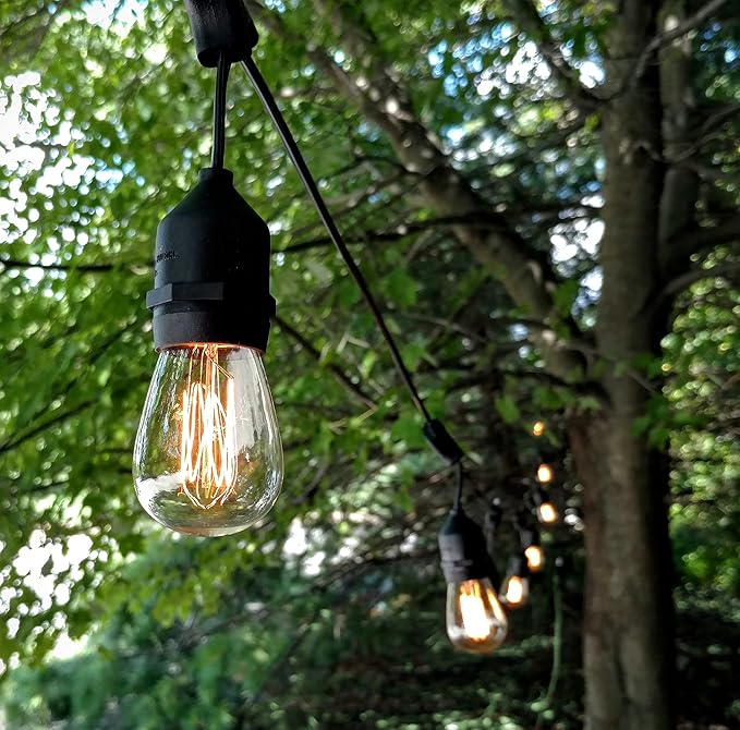 Hometown Evolution, Inc. 50 Foot E26 Commercial Edison Bulb String Lights with 25 Suspended Sockets and S14 Lantern Edison 11 Watt Bulbs-Ruum Studio Home