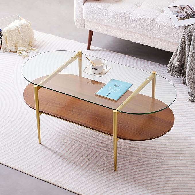 Oval Glass Coffee Table, Mid-Century Modern Design, L41 x W21 x H17 inch, for Living Room, 2-Tier Structure, Clear Glass Top and Walnut Finish Wood Shelf, Conical Legs with Gold Finish Frame-Ruum Studio Home