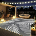 GENIMO Outdoor Rug 8' x 10' Waterproof for Patios Clearance, Reversible Outdoor Plastic Straw Camping Rug Carpet with LED String Light, Area Rugs Mats for RV, Camper, Deck, Balcony, Porch, Grey&White-Ruum Studio Home