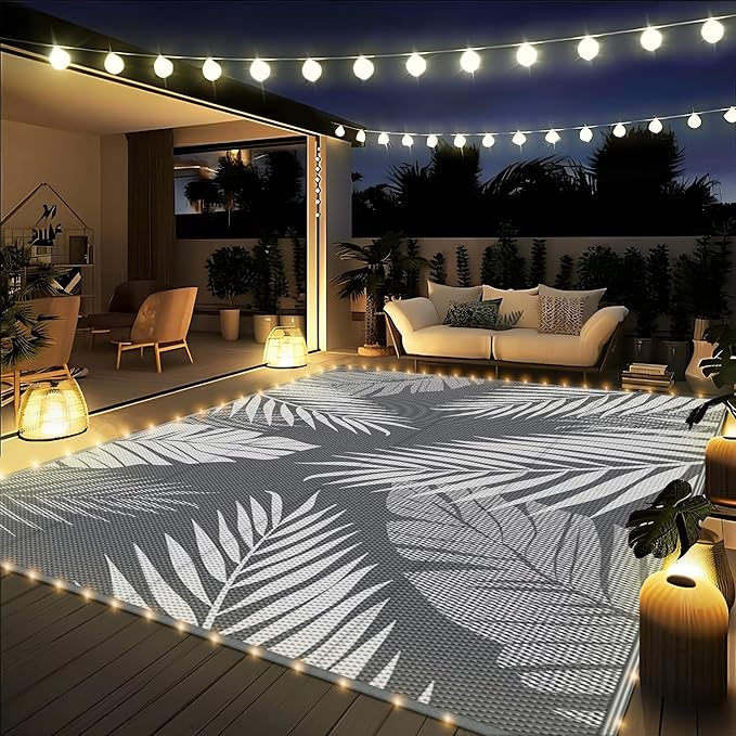 GENIMO Outdoor Rug 9' x 12' Waterproof for Patios Clearance, Reversible Outdoor Plastic Straw Camping Rug Carpet with LED String Light, Area Rugs Mats for RV, Camper, Deck, Balcony, Porch, Grey&White-Ruum Studio Home